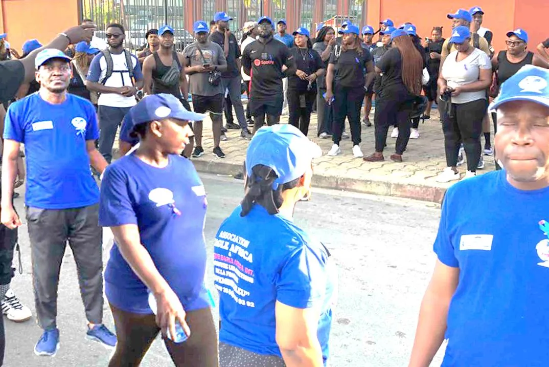 Participants in the Blue November awareness walk in Cotonou on 30 November 2025